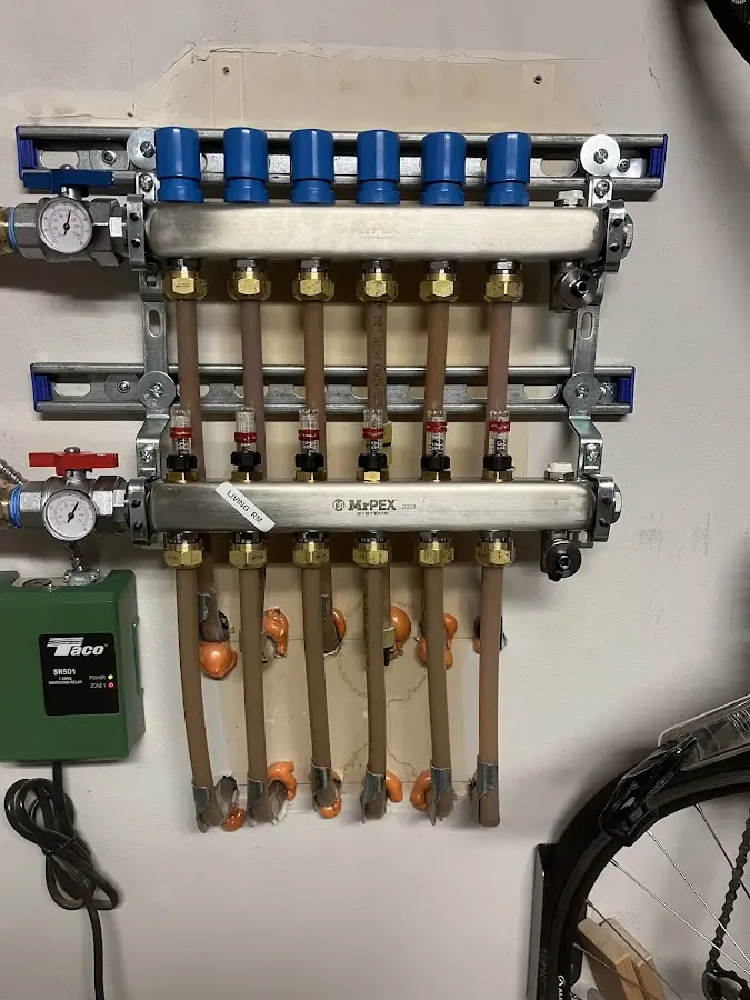 Plumber performing Water Heater Repair at a residential property in Provincetown